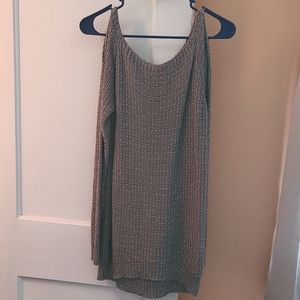 Long sleeve top. Shows off your shoulders. Looks great with a pair of black leg.